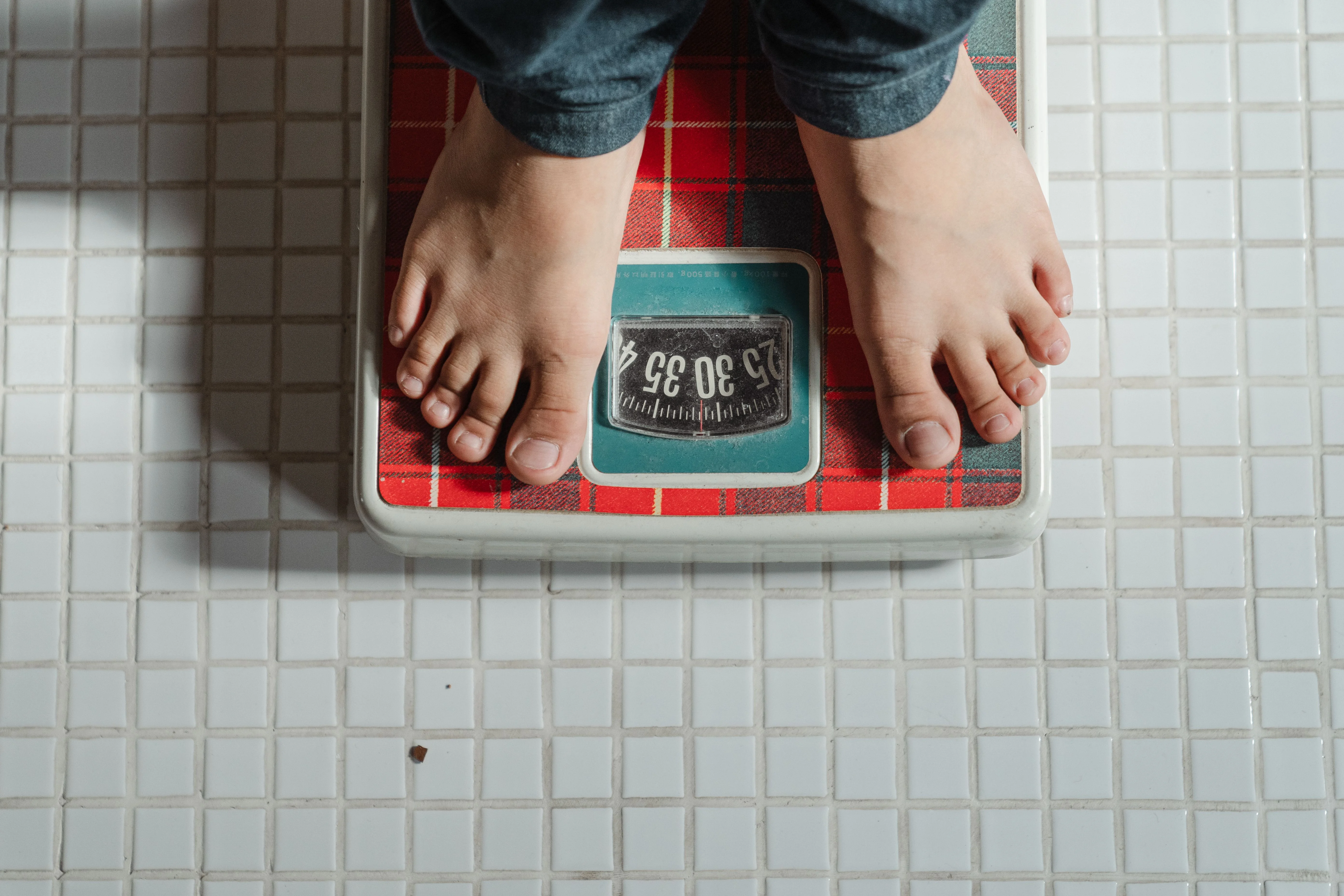 Timeline showing weight loss at 0.25, 0.5, and 1 kg per week